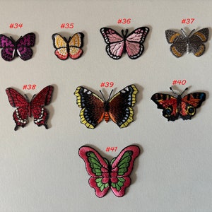 Broderad fjärilslapp med strykfunktion