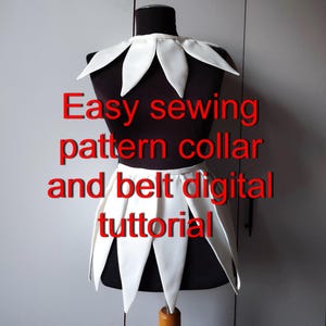 May include: A white petal-shaped collar and matching belt displayed on a black mannequin. The text "Easy sewing pattern collar and belt digital tuttorial" is overlaid in red. The collar and belt feature pointed, leaf-like segments.