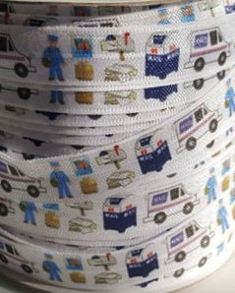 May include: White elastic ribbon with a repeating pattern of mail trucks, mailboxes, letters, and a mail carrier.
