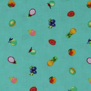 May include: A turquoise fabric with a repeating pattern of various fruits, including pineapples, dragon fruit, kiwi, and berries.