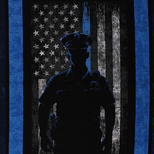 May include: A blue and black fabric with a silhouette of a police officer standing in front of an American flag with a thin blue line. The fabric is decorated with silver and gold police badges and stars.