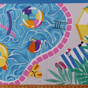 May include: A colorful illustration of a swimming pool with a pink tiled border, a yellow duck float, a blue and yellow inflatable ring, a blue and white striped beach towel, a yellow and white striped umbrella, and green palm leaves.