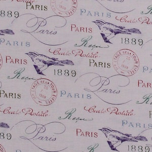 May include: A white fabric with a repeating pattern of purple and blue birds, red and blue stamps, and the words "Paris" and "Courrier Postale" in cursive script. The fabric also features the year "1889" in a circular stamp.