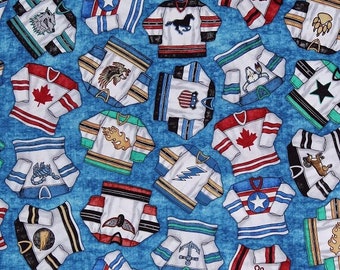 Cotton Hockey Jerseys Teams Logos on Blue Ice Hockey Winter Sports Face Off Cotton Fabric Print by the Yard D658.25 by Quilting Treasures