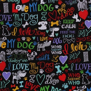 May include: Black fabric with a repeating pattern of colorful hand-drawn illustrations and text. The text includes phrases like "I love my dog", "Keep Calm", "Wagging Tails", and "Who rescued who".