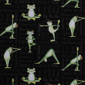 May include: Black fabric with a repeating pattern of green frogs doing yoga poses. The fabric has text that says "Stretch a Little More", "Be in the Moment", "Slow Down", "Find Balance and Harmony", "Lighten Up", "Breathe", "Let Go", "Deeply", "Chill Out", "Take a Deep Cleansing Breath", "Peace and Love", "Slow Down", "Visualize", "Harmony", "S-t-r-e-t-c-h".