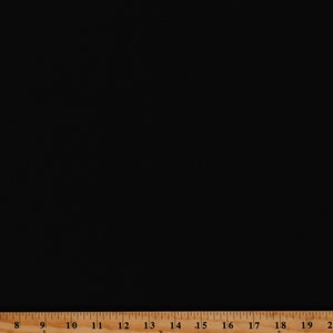 May include: A black fabric swatch with a wooden ruler measuring 20 inches.