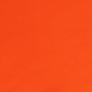 May include: Solid orange background.