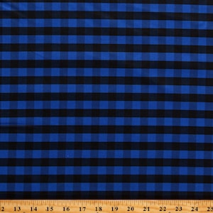 May include: Blue and black checkered fabric with a ruler measuring 25 inches.