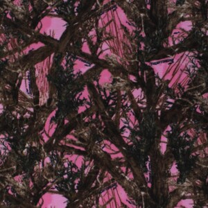 May include: Pink and brown camouflage fabric with a repeating pattern of branches and leaves.