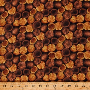 May include: A seamless fabric pattern featuring a repeating design of brown and orange wood slices. The wood slices are arranged in a staggered pattern, creating a rustic and natural look.