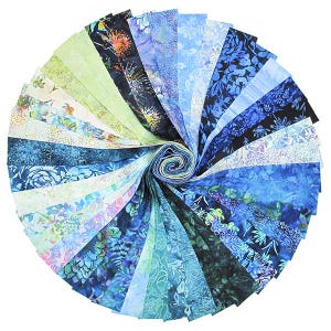 May include: A circular arrangement of fabric strips in various shades of blue, green, and white. The fabric features floral and abstract patterns. The strips are spiraling inward, creating a visually appealing design, suitable for quilting or crafting projects.