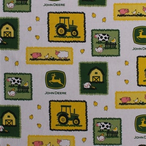 May include: White fabric with a repeating pattern of farm animals, a tractor, a barn, and the John Deere logo. The pattern is in shades of green, yellow, and black.