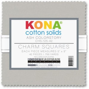 May include: A stack of Kona Cotton Solids charm squares in Ash Colorstory. The label reads "KONA cotton solids" in colorful text. Each square measures 5" x 5". Includes 42 pieces.