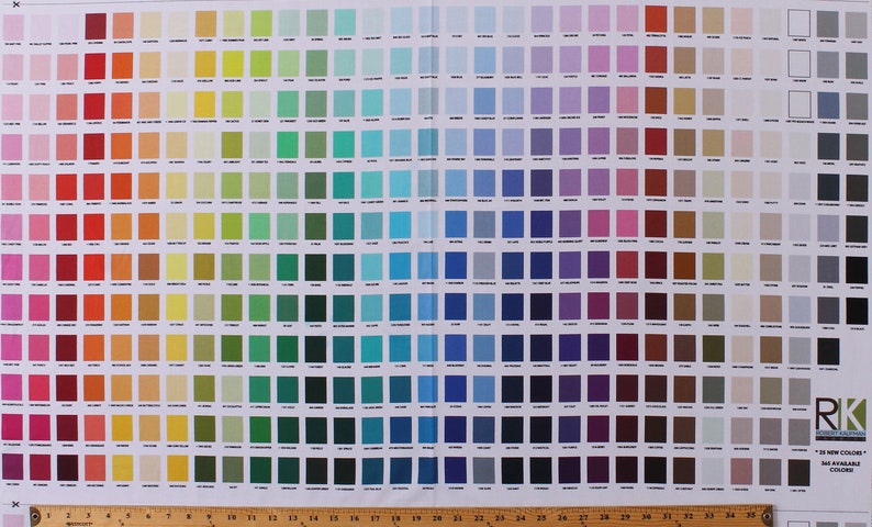 May include: A color chart featuring a wide array of hues, arranged in a grid pattern. The chart displays a spectrum of colors, from vibrant reds and oranges to cool blues and greens. A ruler is placed at the bottom for scale. The chart includes the text "18 New Colors".
