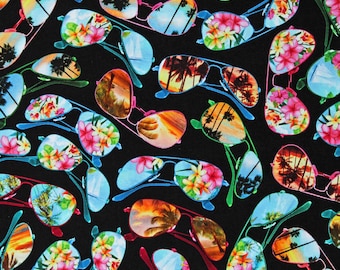May include: Black fabric with a repeating pattern of colorful sunglasses with palm trees and flowers. The sunglasses are in various shades of blue, green, red, and yellow.