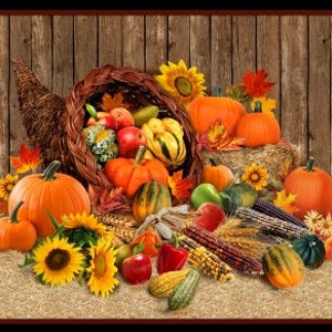May include: A cornucopia overflowing with fall harvest bounty, including pumpkins, gourds, apples, and corn. The cornucopia is nestled in a pile of hay against a rustic wooden background.