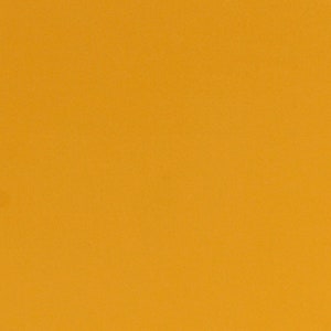 May include: A solid, bright yellow background.