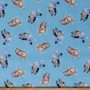 Bluey Fabric, Disney Junior Bluey and Bingo on Light Blue Licensed