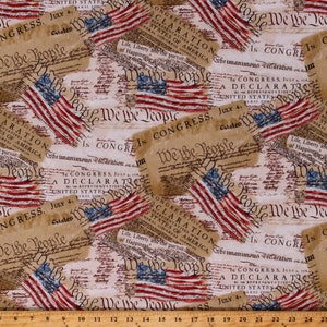 May include: A beige fabric with a repeating pattern of red, white, and blue American flags and the text "We the People" and "In Congress, July 4th".