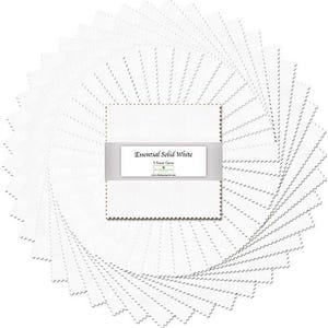 May include: A circular arrangement of white fabric squares, each with a zigzag edge, creating a spiral effect. A label reading "Essential Solid White" is centered, indicating the fabric's color and type. The fabric squares are likely for quilting or crafting.