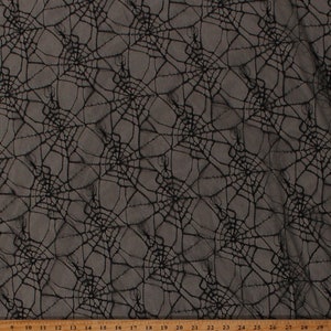 Floral Pattern on Black Stretch Lace Fabric by The Yard 