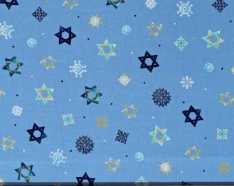 May include: Blue fabric with a repeating pattern of white snowflakes, gold stars, and blue Star of David symbols.