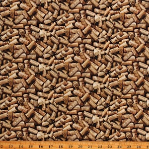 May include: A close-up of a fabric with a repeating pattern of brown wine corks. The corks are arranged in a random pattern and some have text on them, including "LA MAIONE" and "2000".
