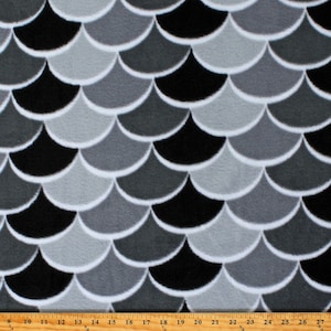 May include: Black, gray, and white fabric with a repeating pattern of overlapping scales.