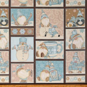 May include: Fabric with a repeating pattern of winter gnomes and snowmen in a patchwork design. The gnomes wear blue and tan hats and scarves. Some gnomes are ice skating, and others are near a mug that says "WARM n' COZY".