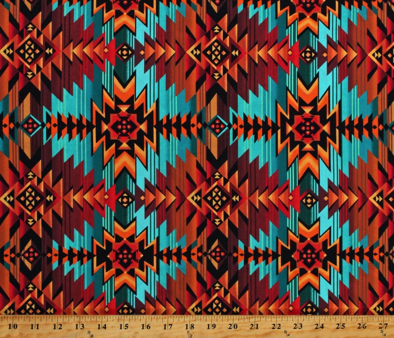 May include: A fabric with a geometric pattern in shades of orange, red, blue, and black. The pattern is reminiscent of Native American designs.