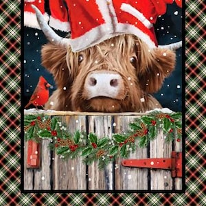 May include: A festive Christmas-themed fabric panel featuring a Highland cow wearing a Santa hat and mittens. The cow is behind a wooden fence decorated with garland. Panel size is 24" x 43".