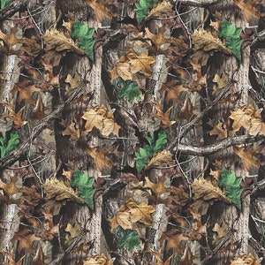May include: Camouflage pattern featuring a blend of brown tree bark, branches, and various leaves in shades of green, brown, and tan. The design creates a natural, woodland camouflage effect, suitable for outdoor apparel or accessories.