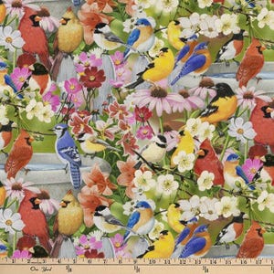 May include: A colorful fabric featuring a variety of birds and flowers. The birds are in various shades of blue, red, yellow, and green. The flowers are in shades of pink, white, and yellow. The fabric is perfect for quilting, crafts, and home decor.