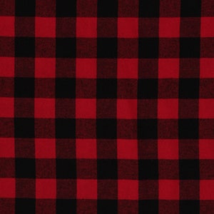 May include: Red and black plaid fabric with a woven texture.