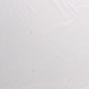May include: White fabric with a subtle grid pattern. The fabric is smooth and has a slight sheen.
