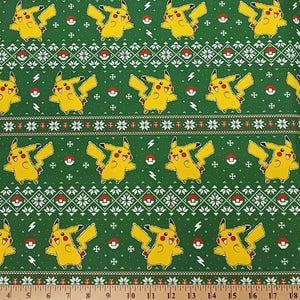 May include: Green fabric with a repeating pattern of yellow Pikachu characters, red and white Poke Balls, and lightning bolts. The fabric has a white snowflake pattern and red and white stripes.