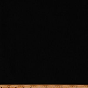 May include: Black fabric with a smooth, even texture. A wooden ruler with inch markings is placed at the bottom of the image.