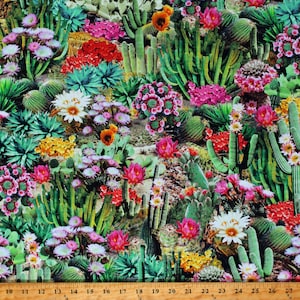 May include: A colorful fabric featuring a repeating pattern of cacti and flowers. The fabric is green, pink, yellow, red, and white. The cacti are tall and slender, with spines. The flowers are blooming and have a variety of shapes and sizes.