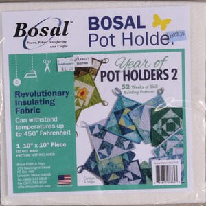 May include: A white 10-inch by 10-inch piece of Bosal insulating fabric for crafts. The fabric is designed to withstand temperatures up to 450 degrees Fahrenheit. The packaging shows a variety of colorful quilted pot holders with the text "Year of Pot Holders 2" and "52 Weeks of Skill Building Patterns".
