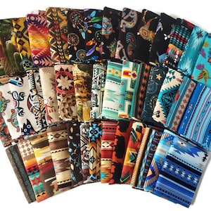 May include: A collection of 24 fabric squares featuring various Native American inspired patterns in shades of blue, red, brown, and white. The fabric squares are arranged in a fan shape.