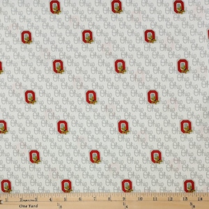 May include: Fabric with a repeating pattern of the word "Ohio" in a script font and the Ohio State University "O" logo in red and white. The fabric is light gray.