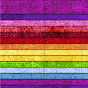 May include: A colorful fabric collection titled "Magic Colors" with 40 Karat Gems. The image displays a spectrum of vibrant fabric strips in shades of purple, pink, red, orange, yellow, green, and blue. The fabric has a textured appearance.