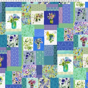 May include: A patchwork fabric design featuring a variety of blue and green floral patterns. The fabric is made up of squares and rectangles, each with a different design. The flowers are in various shades of blue, green, and purple. The fabric is perfect for quilting, sewing, and crafting.