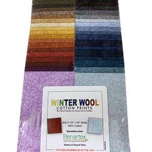 May include: A fabric swatch set featuring a variety of colors and textures. The set includes multiple strips of fabric in shades of green, brown, yellow, red, blue, and purple. The label reads "WINTER WOOL COTTON PRINTS" and includes the dimensions of the strips: 2-1/2" x 42".