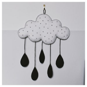 Large monochrome felt cloud with black raindrops nursery wall hanging