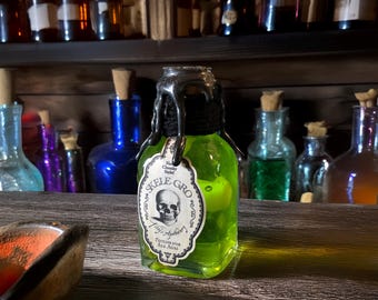 Fles Glow-in-Dark Bone-Gro Potion: Halloween Witch Wizard Prop
