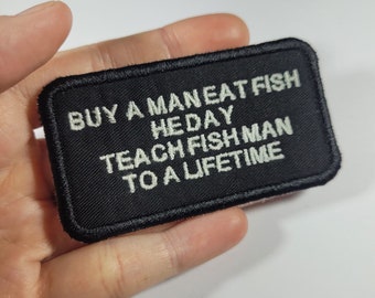 Buy a Man, Eat Fish, He Day - Embroidered Glow in the Dark Iron-on Patch