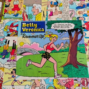 May include: A colorful comic book panel featuring Betty and Veronica. The central image shows Betty running in a red top and black shorts. Text bubbles read "Runner Up" and "Ah! Nothing like that morning run to get the blood circulating!"