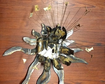 Unique brutalist sun wall hanging sculpture